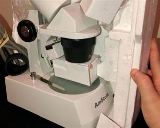 Lot 3571. $175.00  AMscope Binocular Microscope, looks new, no outer box. 