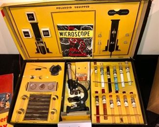 Lot 3557.  $45.00.  Vintage Gilbert Chemistry Set. and box of glass Beakers and Test Tubes, Vintage Gilbert Microscope Chemistry Set (with Polaroid Jr)