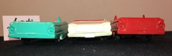 Lot 3572.  $20.00.  Vintage plastic cars + a diecast Jaguar that has a couple minor things missing.  As Is.  