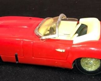 Lot 3572.  $20.00.  Vintage plastic cars + a diecast Jaguar that has a couple minor things missing.  As Is.  