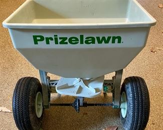 Lot 3530	$85.00.  Prizelawn Commercial Broadcast Spreader Model LF11  (Retails for $265).  "The LF lI "Littlefoot" is the perfect size for light-duty commercial use or for homeowners who demand the best in an affordable spreader." Perfect to winterize your yard now (or prepare for winter salting of your sidewalks!)  .75 cu ft / 50 lb Hopper Capacity
