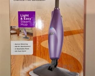 Lot 3574. $25.00. Light and Easy Shark Steam Mop.  Never Opened or Used.  