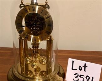 Lot 3581. $125.00. Elgin Anniversary Clock (w/Box) One Model No.E-49, Beautiful glass dome protects the clock.  