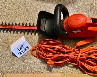 Lot 3585.   $28.00.  Black & Decker Trimmer  Includes power cord