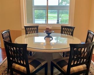 Lot 4001.Asking $1200.00 (Firm) Remi Lugano Limestone table from Italy, with beveled glass top and 6 Emerson et cie Chairs (Paid $3000 for table alone, the beveled glass was another $1000.00 and the chairs were 700.00 Ea.   The Table Top and Base weigh easily 600 lbs.  One of a kind piece that we have never seen in over 20 years of conducting estate sales,  Current location is in Naperville. The rug is from India 8' x 8' and we are including with the table as a bonus.  Note:  We sold this to a customer at our last sale; movers tried to deliver it, but it would not clear the stairs going to her basement.  The movers had to bring it to our garage.  One seat cushion fabric needs to be cleaned, otherwise it shows beautifully. - Top cleans with Windex!