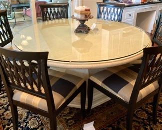 Lot 4001. Asking $1200.00 (Firm) Remi Lugano Limestone table with beveled glass top and 6 Emerson et cie Chairs (Paid $3000 for table alone, the beveled glass was another $1000.00 and the chairs were 700.00 Ea.   The Table Top and Base weigh easily 600 lbs.  One of a kind piece that we have never seen in over 20 years of conducting estate sales,  Current location is in Naperville. The rug is from India 8' x 8' and we are including with the table as a bonus.  Note:  We sold this to a customer at our last sale; movers tried to deliver it, but it would not clear the stairs going to her basement.  The movers had to bring it to our garage.  One seat cushion fabric needs to be cleaned, otherwise it shows beautifully. - Top cleans with Windex!