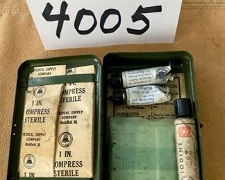 Lot 4005. $75.00. Just Added.  Vintage WWII Era Medical Kit and First Aid Metal Box.  The medical kit has bandages and first aid items.  Perfect gift for a vintage WWII buff and Militaria collector.