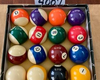 Lot 4007  $50.00  Just Added.   1 set billiard balls that look brand new and 1 Minnesota Fats Pool Cue. 