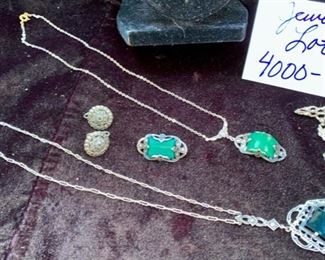 Jewelry Lot 4000-T. $75.00. All Sterling Silver Vintage jewelry lot:  1 necklace with green (jade?) stone in a beautiful setting, one pin with same stone and shape, one necklace with black stone, perhaps onyx or obsidian, interesting silver filagree surrounding stone, one pair of sterling silver round earrings and a 2" long sterling drop pin. 