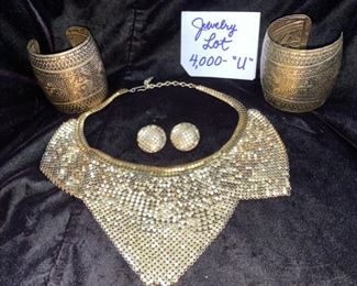 Jewelry Lot 4000-U. $50.00. Whiting & Davis 1970's Gold Mesh necklace/scarf and matching earrings.  Also, two gold-tone embossed cuffs, Egyptian Style.  Fun Lot!