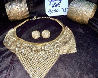 Jewelry Lot 4000-U. $50.00. Whiting & Davis 1970's Gold Mesh necklace/scarf and matching earrings.  Also, two gold-tone embossed cuffs, Egyptian Style.  Fun Lot!