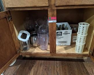 Contents Of Cabinet, Plastic Pitchers, Malt Vinegar, Salt And Pepper Shakers