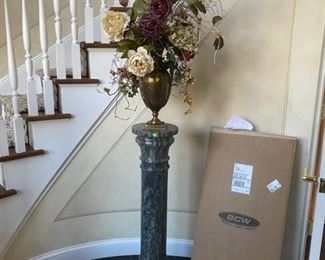 pedestal and floral arrangement