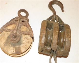 LOTS OF VINTAGE PULLEYS.