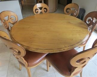 AVAILABLE FOR EARLY SALE.  $3200.00.  STUNNING  FRENCH COUNTRY BURNISHED CHESTNUT TABLE 5 FT. IN DIAMETER WITH 6 MATCHING CHAIRS.