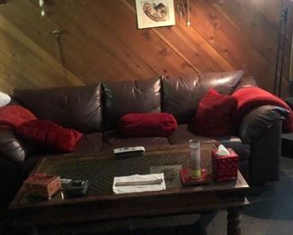 Brown Leather sofa $195 Metal & wood coffee Table $110 