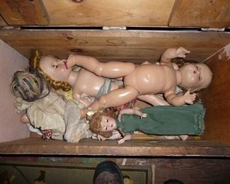 dolls in vintage toy box