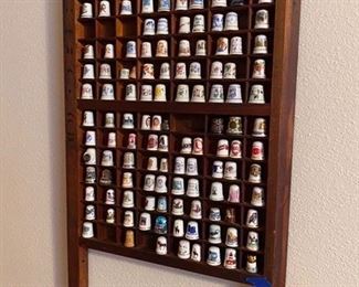 $150 State & Nature thimbles in curio 