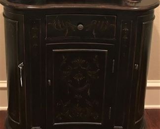 Curved front cabinet