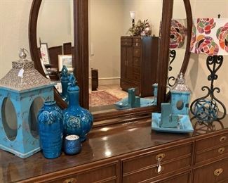 Bedroom dresser with round mirror