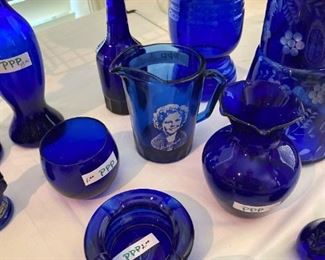Cobalt glassware including a Shirley Temple cup