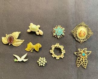 Vintage brooches. All are good with no missing stones and clasp's are good. None are marked. Lot of (9) - $30