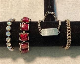 Lot of 4 bracelets - Vintage unmarked rhinestones, "Coro" Pegasus " (1945-1955) red fleck lucite linked stones, engraved sweetheart bracelet, unmarked chain bracelet. $25