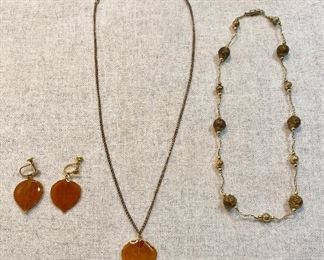 Vintage Colorado Real Aspen  made necklace and screw on earrings. Second necklace is gold tone chain with gold beads and embossed gold beads. Excellent condition. Lot of (2) $10