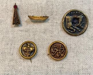 Vintage lot of pins, top row left to right = "TV50" red ruby pin, very old "Unity" pin, old double sided coin. Bottom row old gold tone pin with crown and old gold tone pin with unknown marking. All good pin backs. (Lot of 5) $7