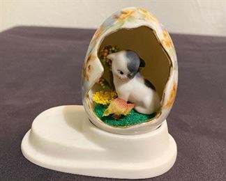 Kewpie Doodle dog in porcelain egg. $15