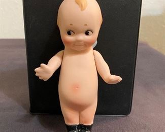 Larger porcelain Kewpie with jointed arms. $18