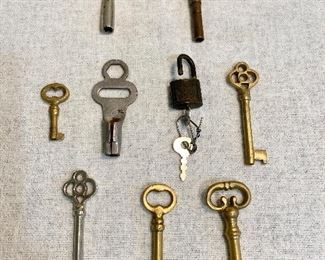 Lot of old keys - Top = Clock keys, middle row is a old skate key, a mini padlock marked "SLC" made in USA. Others are skelton keys. (Lot of 9) $10