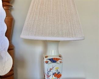 $50 each - Lamp with white shade 21 1/2 in. (H) x 12 in. shade at base (W) resting on black wooden 4 1/2 in. square - 2 available