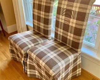 $295 - Pair of plaid,  high backed chairs; 43 in. (H) x 20 in. (W) x 24 in. (depth); 18 in. (floor to seat) and 25 in. (seat to top of chair back)