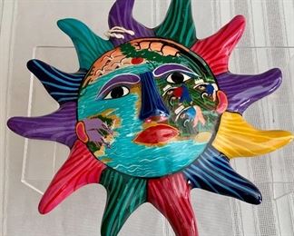 $25- Painted ceramic sun with face wall hanging  #2; 9 1/2 in. (diameter)