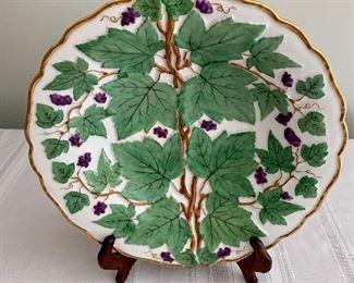 $250 - grape and grape leaf motif decorative gold rimmed Meissen porcelain plate. 2 in. (H) x 11 in. (diameter) 