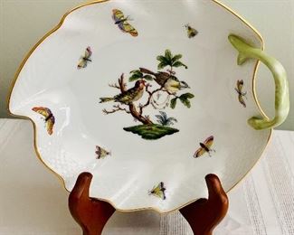 $50. Herend porcelain leaf shaped dish with handle; approx. 2 1/2 in. (H, highest) x 7 1/2 in. (L). Stand not included.