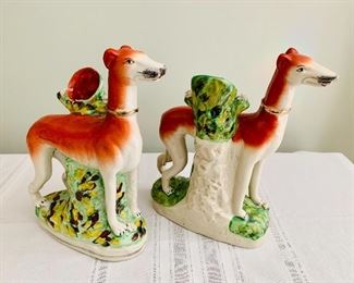 $300 - pair of antique porcelain dog table decorations; 10 1/2 in. (H) x 9 in. (W) x 3 in. (depth)