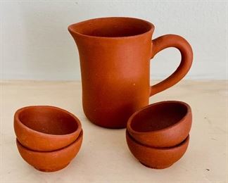 $25 - Pitcher and four bowls, pitcher 2 1/2 in. (H) x 3 in. (W, with handle)