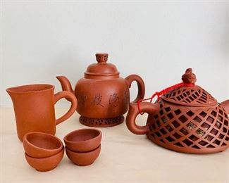 Suite of Asian clay beverage service.  Priced separately.