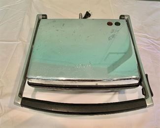$25 - Panini press; Krups (made in China for Krups); 4 in. (H) x 12 1/2 in. (W) a 12 1/2 in. (depth)
