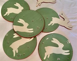 $130 for ALL - Joan Tatum decorated redware bunny plates; 4 round plates 9 in. diameter; 1 plate with rabbit side extension 8 1/2 in. (plate diameter) x 12 in. at widest point plus a single rabbit wall hanger 6 in. (H) x 7 in. (W)