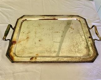 $75 - Wilcox silverplate tray; 21 in. (length including handles); 18 in. (serving surface) x 14 in. (W)