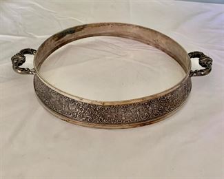 $30 - Silver plate pie plate or dish holder; 1 3/4 in. (H) x 9 1/4 in. (diameter)