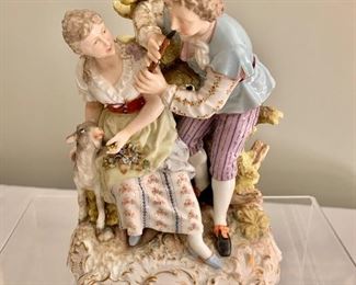 $75 - Porcelain figurine. AS IS.  7.5"H 