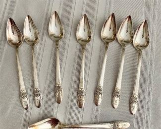 $45 - 8 Silver plate spoons. 6"L