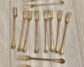 $45 - 12 Small, silver plate forks. 6"L