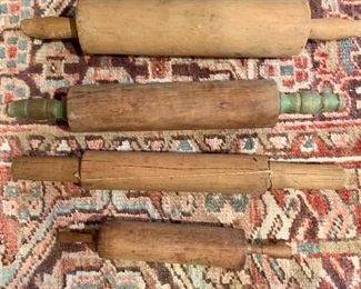 $45 - Lot of 4 vintage rolling pins; three approx. 17 in. (L) and one approx. 11 in. (L)