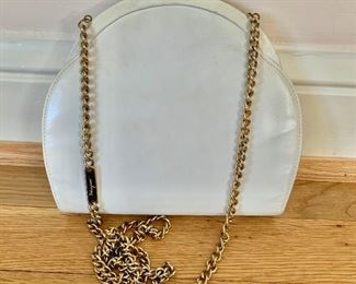 $50; Vintage white Ferragamo leather evening bag with link shoulder strap; 7” w x 8” h