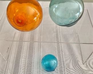$45 set; Blown glass balls; 1”, 2” and 2” respectively